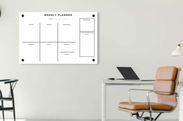 acrylic planner on wall in modern home office