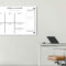 acrylic planner on wall in modern home office