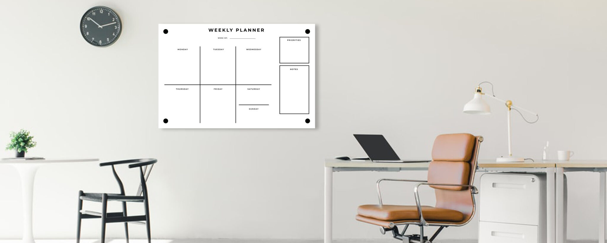 acrylic planner on wall in modern home office