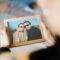 Person holding a custom picture frame with a photo inside