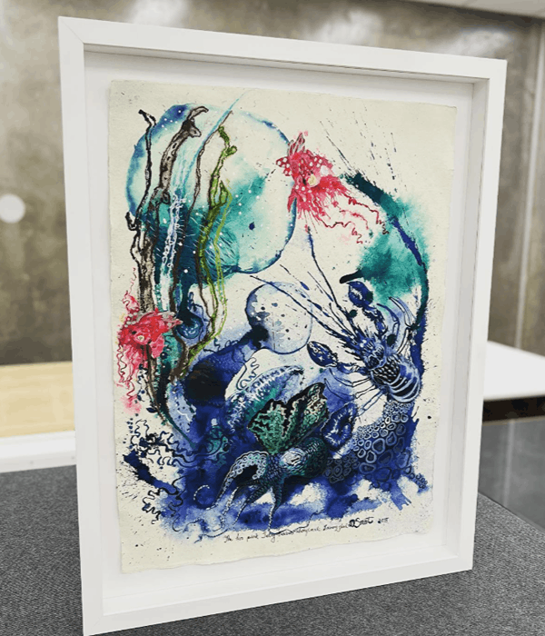 artwork in white frame